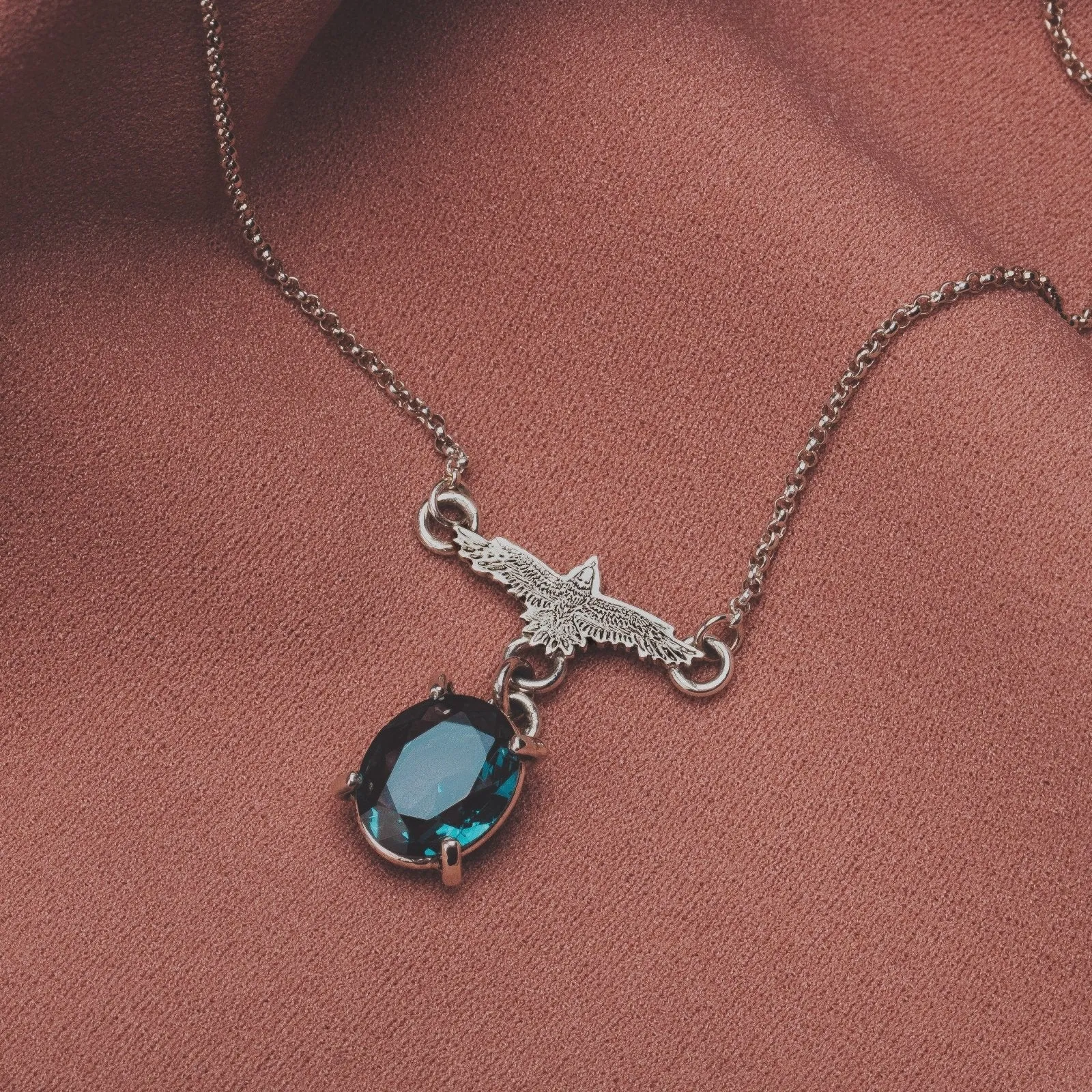 Raven Necklace With Teal Blue Topaz