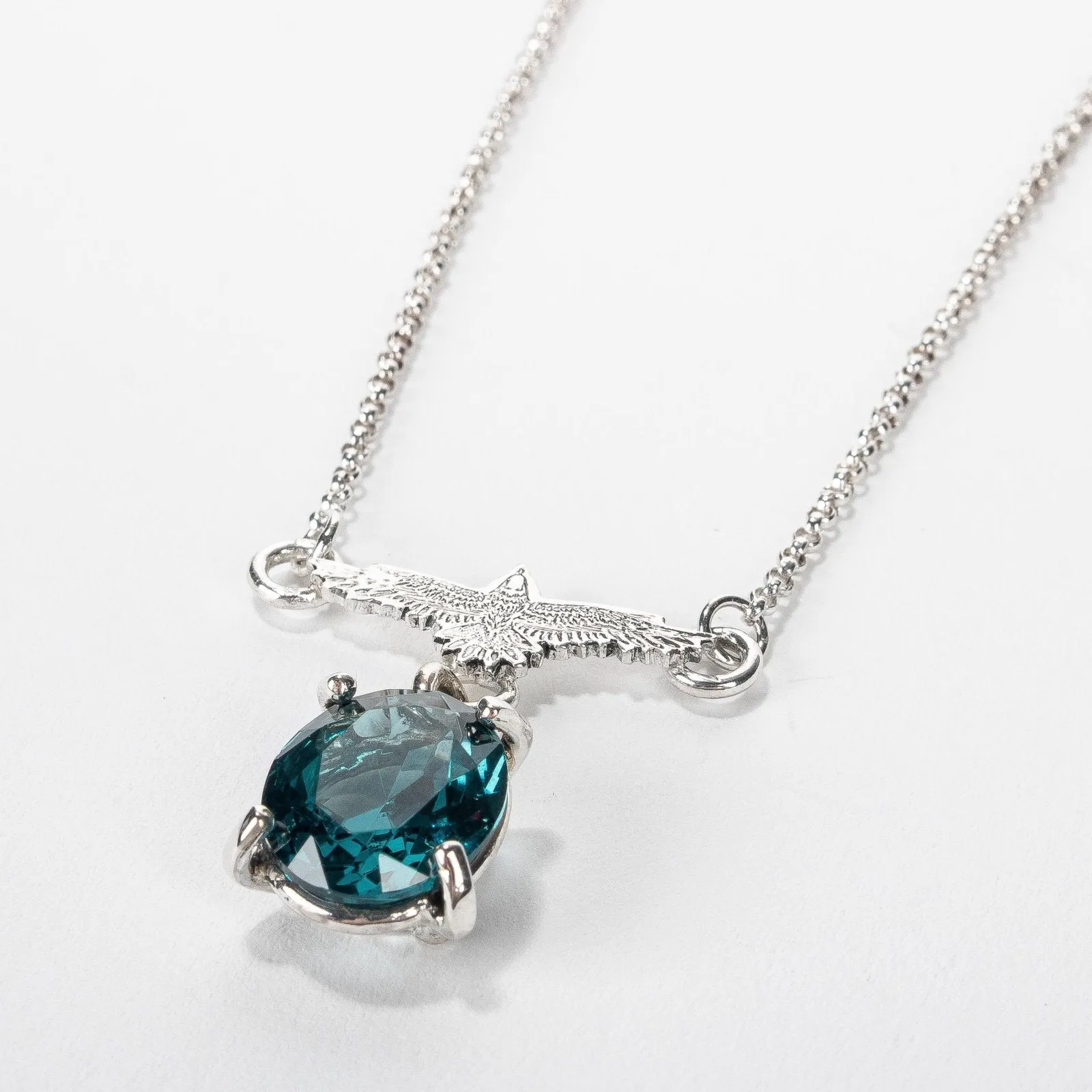 Raven Necklace With Teal Blue Topaz