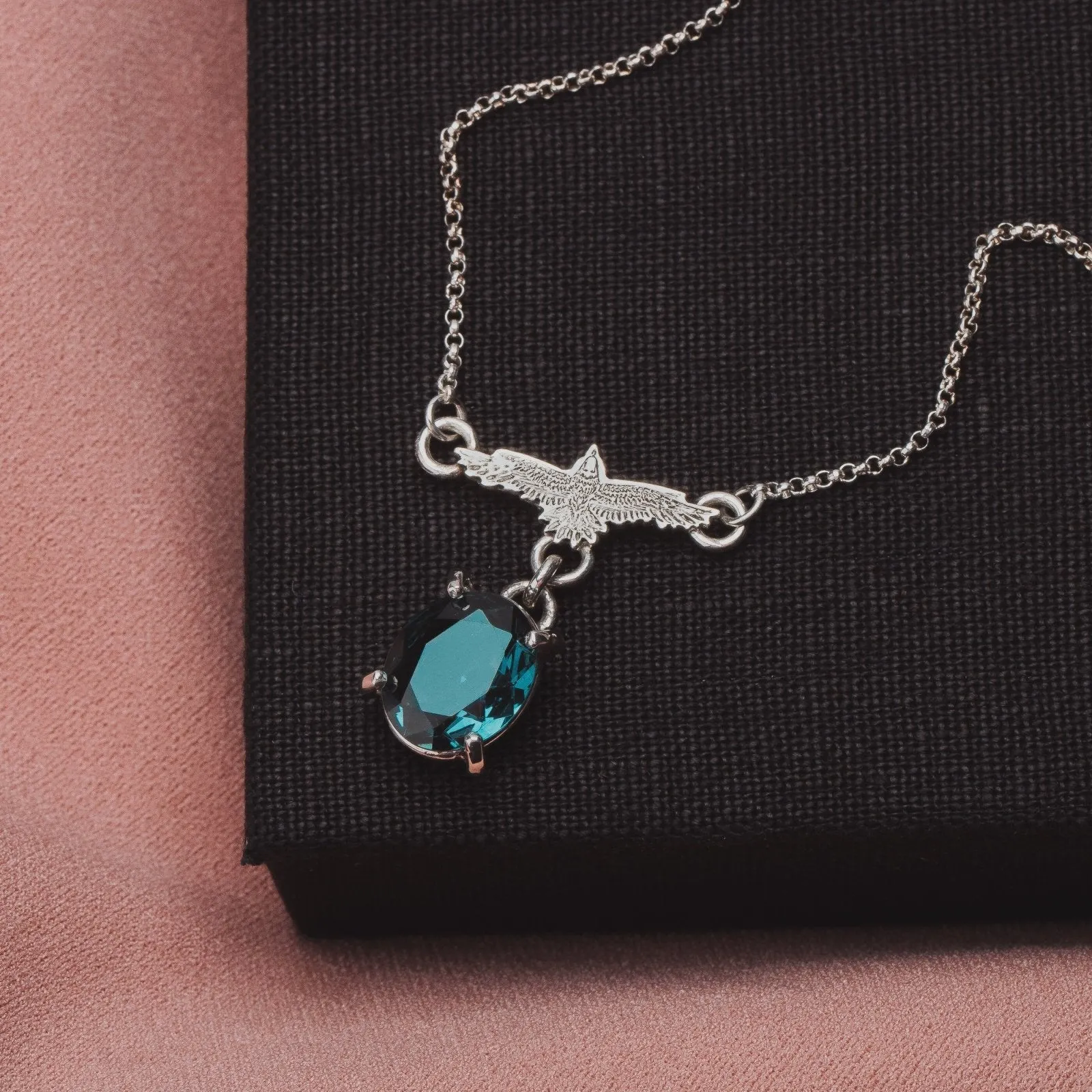 Raven Necklace With Teal Blue Topaz